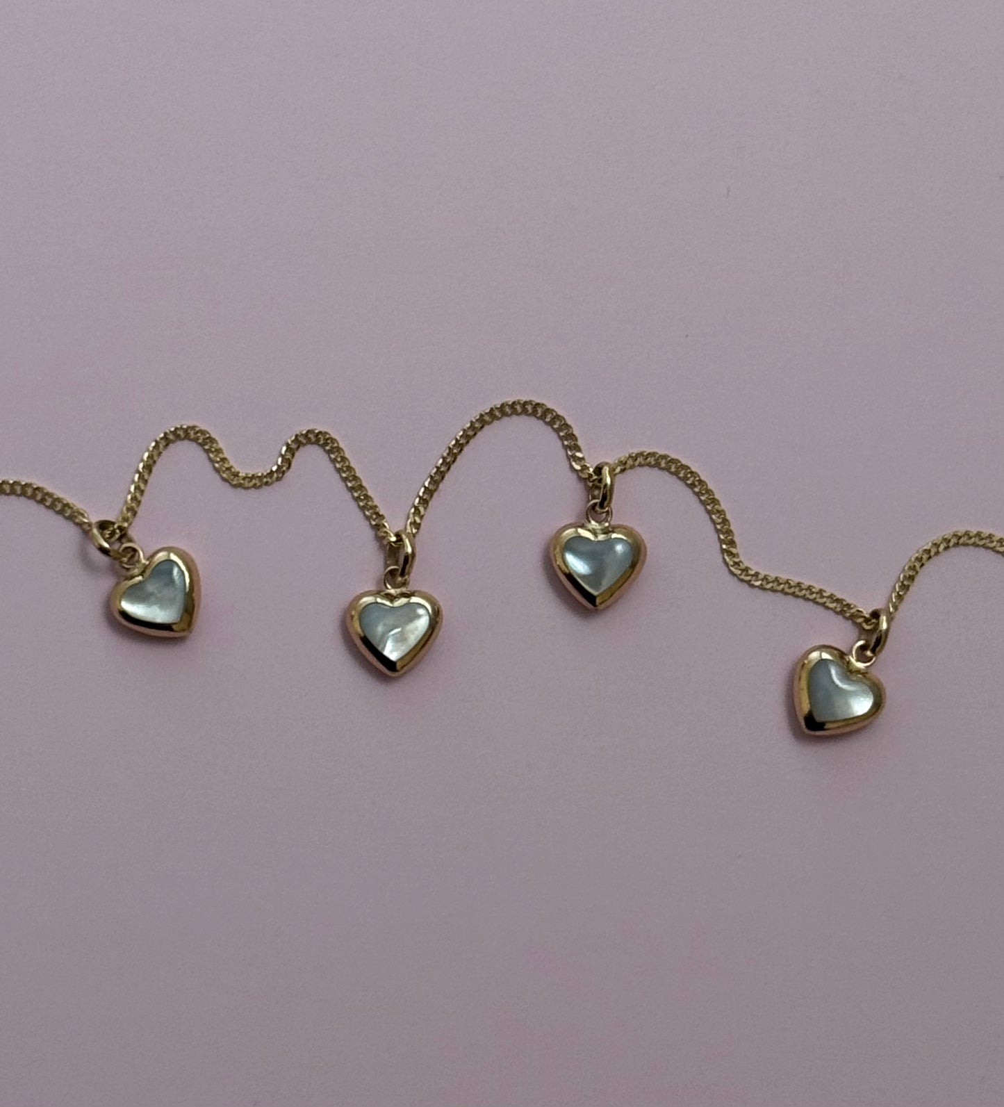14k Puffy Mother Of Pearl Heart Pendants